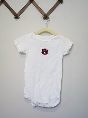 Creative Knitwear White Baby One-Piece Bodysuit with Auburn Logo